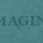 Bricks lined up to show the word Imagine, signifying diversity at work