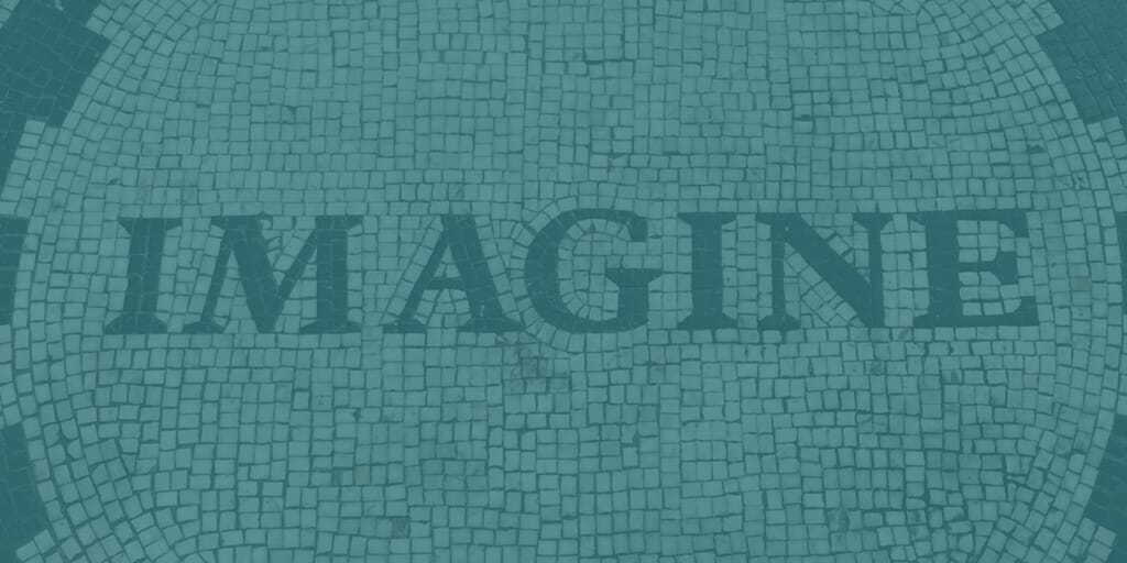 Bricks lined up to show the word Imagine, signifying diversity at work