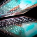 half closed laptop facing right