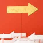 A yellow arrow pointing to the right in front of a red background. There are smaller white arrows pointing to the left in the foreground