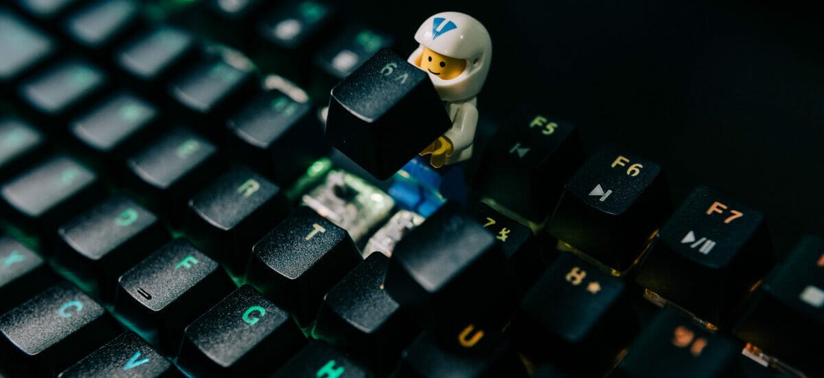 A little LEGO figure helping to repair a computer keyboard